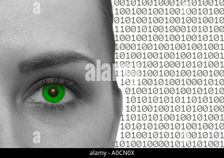 Digital composite of woman`s eye and binary codes Stock Photo